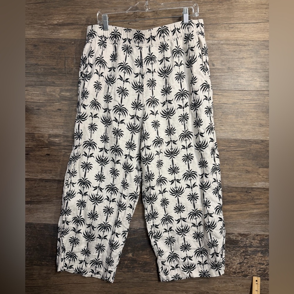 Nicole Miller Black Palm-Print Cropped Trousers on white